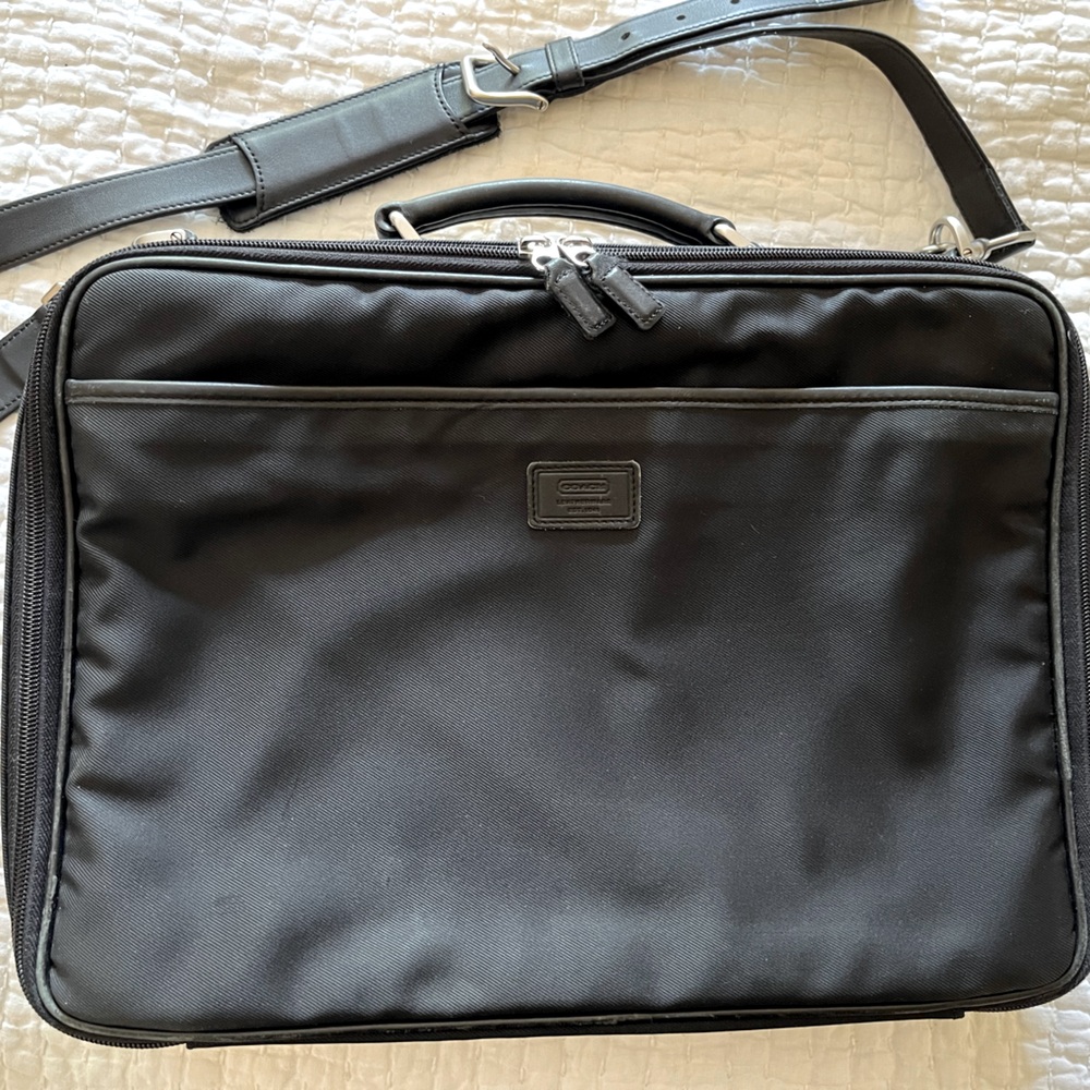 Coach laptop/briefcase in sturdy luggage fabric padded with pockets for stuff